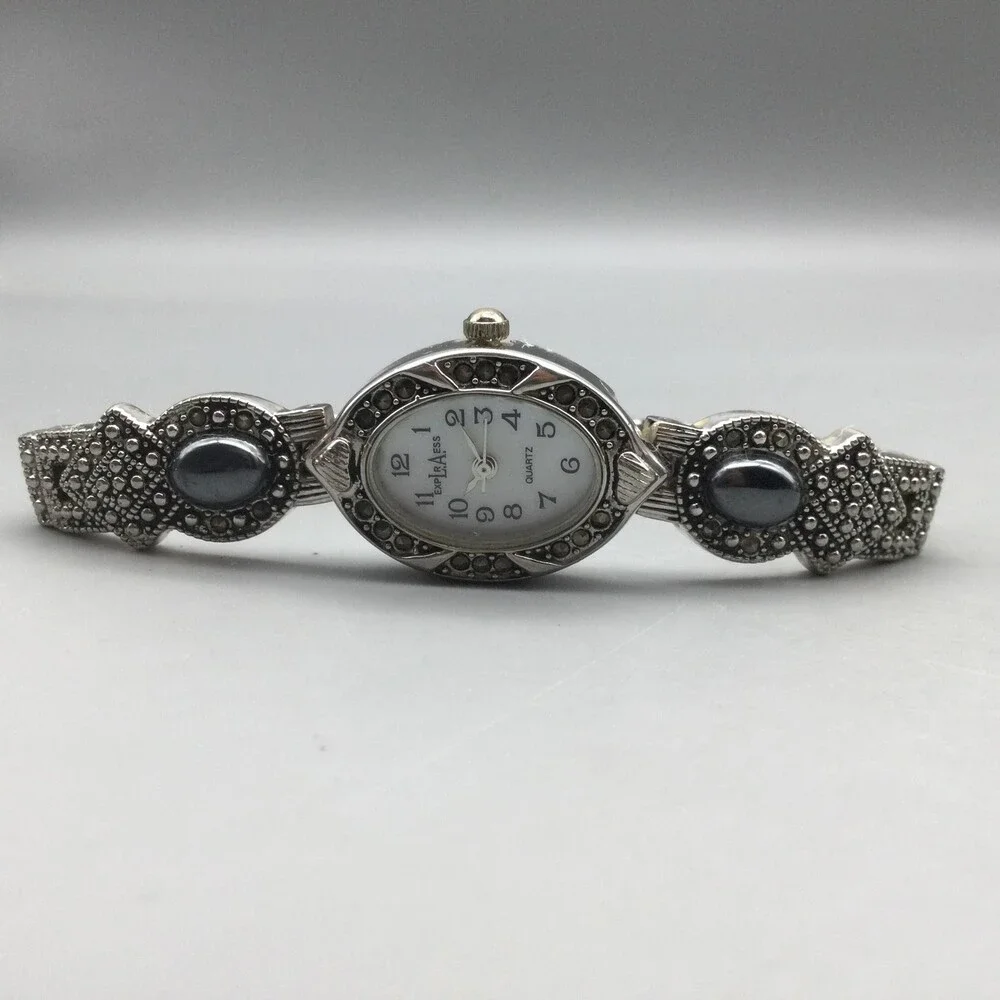 LA Express Womens Watch 18mm MOP Dial Silver Tone Marcasite Stretch New Battery